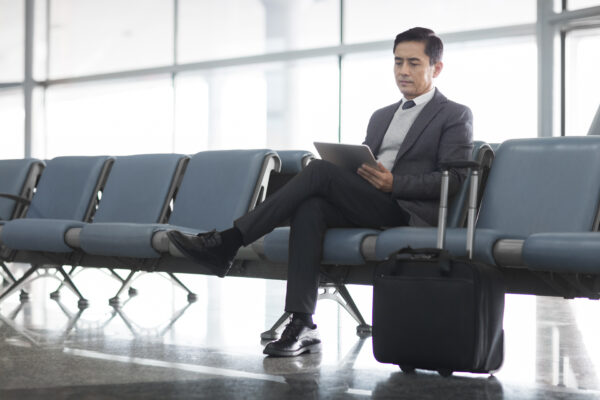 Chinese Businessman Waiting In Airport