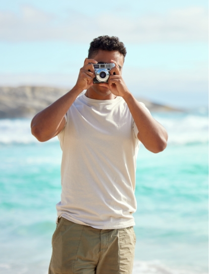 Shot Of A Young Man Taking Pictures