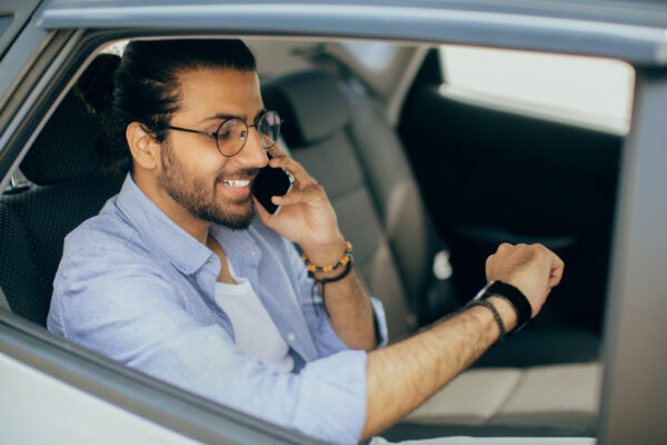 Happy Indian Man Going To Airport By Taxi